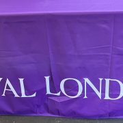 purple table cloth print across