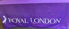 purple table cloth print across